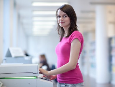 Woman using a photocopier